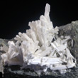 White Natrolite Spray on Matrix